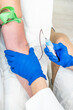 © Alvaro Lavin/Stocksy - doctor drawing blood from patient
