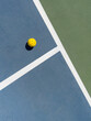 © Raymond Forbes LLC/Stocksy - Pickleball court background texture with lone ball and lines