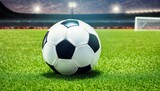 Fototapeta Sport - soccer ball on grass