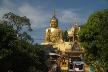 Pra Put Ratanamani Srihathai Naresuan Or Luang Por Pan Lan Large Golden Sitting Outdoor Buddha In Wat Maniwong. It Is A Beautiful And Faithful Buddha Image. Located At Nakhon Nayok Province In Thailan
