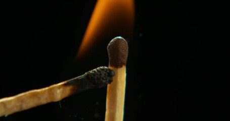Wall Mural - burning, fire and match on black background for danger, art and risk in studio. power outage, closeu