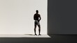 © TensorSpark - Minimalistic scene with the silhouette of an athlete and dramatic hard shadows. This composition symbolizes determination, strength, and the disciplined pursuit of physical excellence. Generative AI