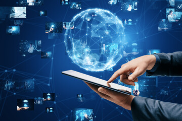 Aufkleber - Connecting businesspeople, video conference concept. Close up of businessman hand using mobile phone with abstract blue globe with polygonal mesh and images on blurry background.