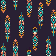 Wall Mural - Boho seamless vector pattern with feathers. Aztec style.