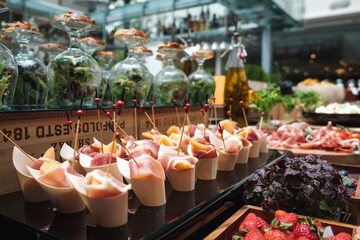 catering buffet food buffet table with snacks and fruits. 