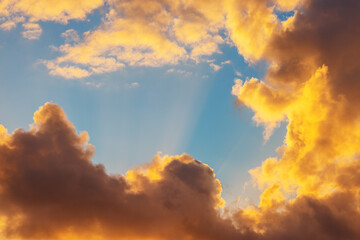 Wall Mural - sunrise dramatic sky clouds with sunbeam rays, god and heavens