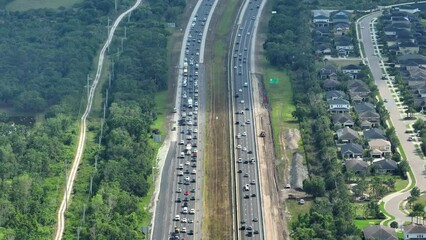 Poster - Aerial view of busy american freeway road under construction with heavy traffic in Sarasota, Florida. Development of transport infrastructure. Interstate transportation concept