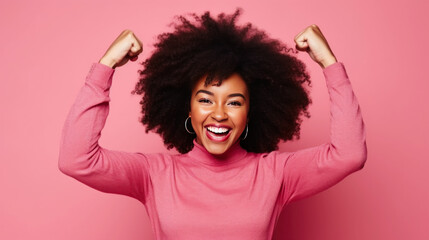 Portrait of a happy afro american woman celebrating success isolated over pink background. Generative AI.