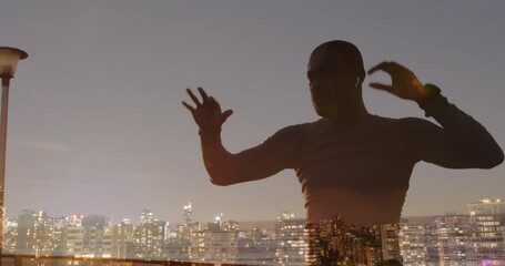 Poster - Animation of cityscape over an exercising african american man
