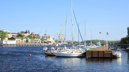 Poster - yachts moored on the pier in summer.