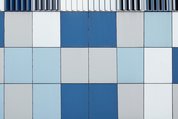 Poster - Abstract modern architecture. Blue and white tiles in an office building exterior.