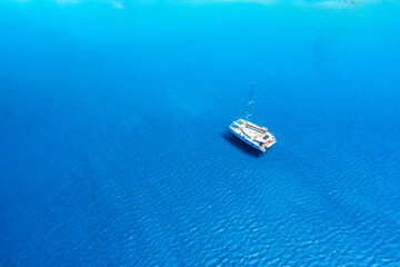 Wall Mural - drone view of a sailing yacht. luxury transportation. vacationing people. vacation and holidays. sum