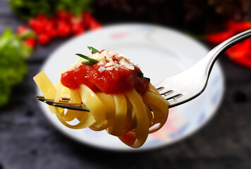 Sticker - Pasta with tomato sauce on fork