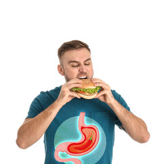 Wall Mural - Improper nutrition can lead to heartburn or other gastrointestinal problems. Man eating burger on white background. Illustration of stomach with hot chili pepper as acid indigestion