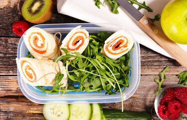 Wall Mural - lunch box- sandwich wrap with smoked salmon and salad