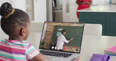 Poster - African american girl using laptop for online lesson with biracial male teacher on screen