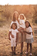 © Cavan Images - happy large family, life in the countryside,mommy and three daughter