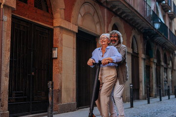 Wall Mural - Stylish pensioners on alternative transportation.