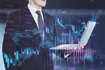 Aufkleber - Headless busiessman using laptop with glowing candlestick forex chart on blurry office iterior background. Investment, profit and financial growth concept. Double exposure.