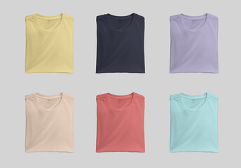 Wall Mural - Mockup of bright folded t-shirts, shirt with label isolated on white background, front view. Set