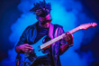 © VisualProduction - Young african american musician playing the guitar. Young rock star playing electric guitar at a concert. Generative AI