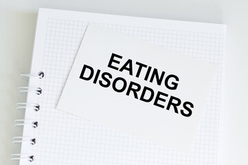 Wall Mural - a business card with the text of Eating Disorders