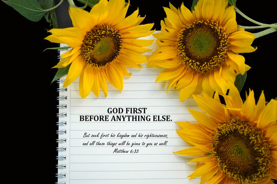 Wall Mural -  - Bible verse quote - God First before anything else. Matthew 6:33 But seek first his kingdom and his righteousness, and all these things will be given to you as well. On notebook and sunflowers.