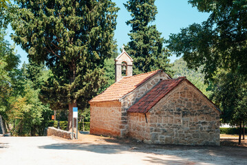 Wall Mural - Stone old church in Krka National Park, Skradinski Buk, Croatia