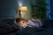 © famveldman - Child sleeping in dark bedroom. Little boy napping