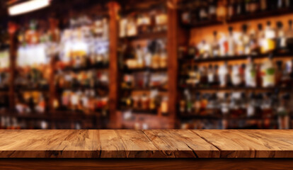 wooden table with blurred liquor bar background
