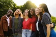© Vane Nunes - Young multiracial women having fun outdoor - Diverse female friends hugging each other during summer vacations at city park - Focus on center faces