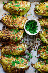 Canvas Print - Roasted green cabbage with parmesan.top veiw