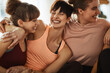 © Flamingo Images - Female friends laughing together after an exercise class