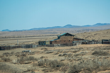 Wall Mural - Local farm on Highway road in Central Mongolia, the road trip from Ulaanbaatar to Kharkhorin city