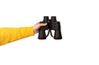 binoculars in hand isolated on transparent background, search concept.