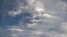 Clouds That Look Like Cirrostratus Move Across The Sky In The Afternoon