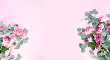 Poster - wedding or mothers day background, bouquet of roses and herberas with fresh eucaliptus leaves over plain pink background