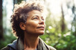© TRINETTE + CHRIS - Mature mixed race in nature in forest looking up. Generative AI.