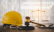 Judge's hammer and helmet Law and Justice about labor law concept Construction law..