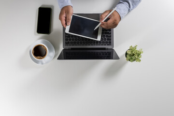 Poster - person designer computer laptop datum document research chart finance marketing Working on a white desk in an office workplace view overhead modern space flat lay