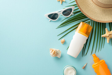 uv safety awareness month. high angle view photo of sun protection lotion, sunglasses, straw hat and