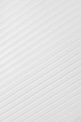 Poster - white abstract background of diagonal folded striped pattern, perspective, top view, backdrop for ad