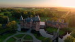 Aerial view on a Kasteel de Haar Utrecht Netherlands, old historical garden at castle de Haar Netherlands Utrecht on a sunset from the air with a drone in 4K.