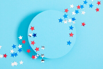 Wall Mural - 4th of July, USA Presidents Day, Independence Day. Flat lay top view of celebration decor, circle for text twinkling confetti on blue background, promotion or greeting message