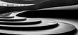 © Alexa Joy - Rounded architecture of stairs. Curvilinear steps. Modern minimalistic geometric background. Art black and white construct