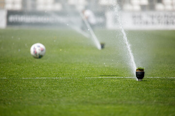  Watering the lawn water grass football field