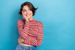 © deagreez - Photo portrait of attractive young woman touch cheeks look empty space cute wear trendy striped clothes isolated on blue color background
