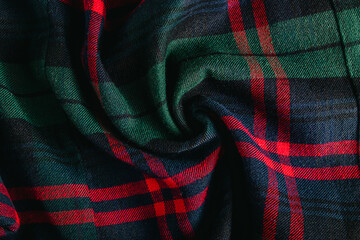 Checkered cotton fabric close-up. Texture of fabric for sewing. Natural flannel for shirts.