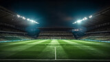 Fototapeta Londyn - soccer stadium illuminated by spotlights and empty green grass playground, big stadium