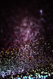 Fototapeta Tęcza - Blurred multicolor black background with glitter. Abstract space background with free space for your text, web design. . Christmas background.